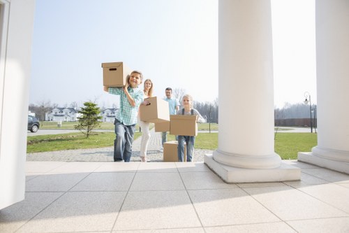 Professional movers handling a compact relocation job